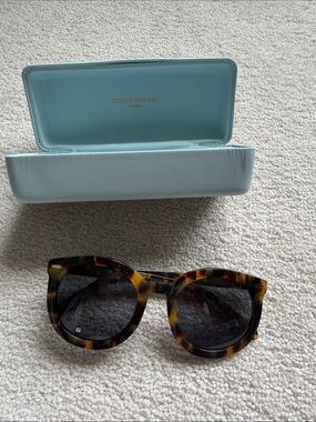 Karen Walker Tortoiseshell Round Cat-Eye Sunglasses with Dark Lenses